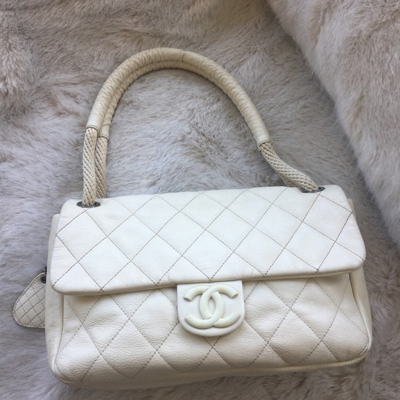 CHANEL Handbags - Chanel flap quilt bag white ivory CC rope strap expandable cruiser